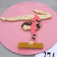 Gymnast Cookie I know it's not a cake, but I had to put it in the gymanstics album!This cookie was hand cut from an original stencil I drew, and iced...
