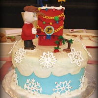 Charlie Brown Christmas Charlie Brown and the doghouse are hand molded gumpaste with fondant accents. The snowflakes are piped royal icing.