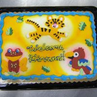 Baby Animals A buttercream baby shower cake based off a blanket.