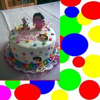 Dora The Explorer And Boots Cake this was for my cousins 3rd birthday party. its yellow butttercake and vanilla custard and the figures are all gumpaste.