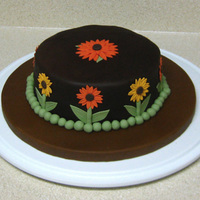 Daisy Cake This was the final cake I made for my Fondant and Gumpaste class. The colors in the photo are a bit off, but I had a very hard time finding...