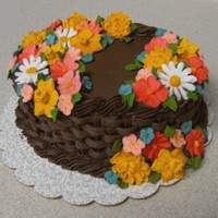 Wilton Course 2 Final Cake I'm not completely in love with this cake, but I didn't plan my palette as thoroughly as I would have liked. Also, my basketweave...