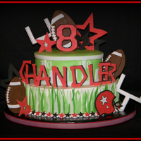 Football Fun The little guy wanted some kind of football cake and said his favorite color was red. 12" and 8" are iced in buttercream with...