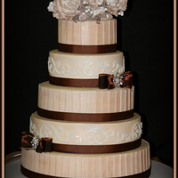 50Th Anniversary Cake This was my first 5 tier cake. Thanks to everyone for the great tips on how to get it there safely!!!! The pleats are fondant brushed with...