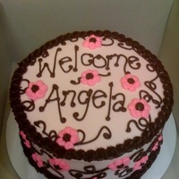Welcome Baby Girl Chocolate fudge cake with buttercream filling and buttercream and chocolate frosting.