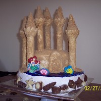 Ariel Beach Castle For my daughters 5th bday. Will definately change how I do things if I made it again to make it easier. I will use crushed cookies instead...