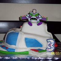 Buzz Lightyear Space Ship This was for my son's 3rd bday. It was my first carved cake and my first time using homemade fondant. I think I did pretty good. Thank...