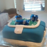 Any 1 Wants A Beer? This a Fathers day cake i made this year. It was a Yellow cake with Fondant, The ice i made out of gelatin. first time trying it.. everyone...