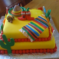 Fiesta Theme Engagement Cake made this for a fiesta theme party...one of the chili peppers have a tie on and the other is wearing a vail :)