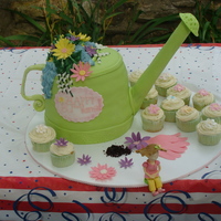 80Th Birthday This was for an 80th birthday. She has a green thumb and loves to garden. The cake is pound with choc chip filling and the top is chocolate...