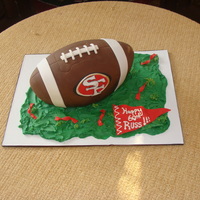 Football Birthday Cake this was a cake for a 60th B-day. He is a 49ers fan. It was a fun cake and my first carved cake.