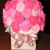 Cupcake Bouquet - Large Large cupcake bouquet - made with a 6" styrofoam ball.Held about 55 mini cupcakes. Rosettes made with buttercream.