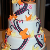 Butterflies Butterflies made of gumpasteColor combination request of customer - came out better than I thought it would.Two tiers - 8" and 10&quot...