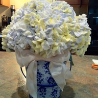 Hydragenea Cupcakes Hydragenea Cupcake Bouquet - 5" Styrofoam BallHeld about 30 mini cupcakes. Striped piping bag, with yellow, purple, and a hint of blue...