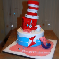 Dr. Seuss Cat In The Hat 3 Tier - Hat sculpted completely out of Krispy Treats using 4" inch pansBox is carrot cake with cream cheese icing - 6" square -...