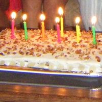 Prune Cake My first prune cake, covered with vanilla icing (didn't have a recipe back then) and sliced almond.