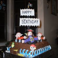 Pirate Birthday The cake is chocolate brownie with melted chocolate covered in the shell to make a wood like affect. All pirates are also made from...