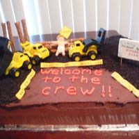 Baby Under Contruction chocolate everything cake! large hill and small hill are sports ball and mini ball pans. covered in crushed cookies. gumpaste baby in hard...