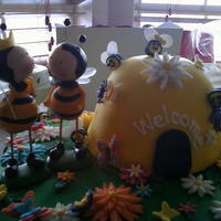 Spring And Bees Bee theme cake for my SIL. Chocolate cake with buttercream and fresh strawberries. Covered in fondant and lots of fondant flowers, bees,...