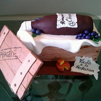 First Wine Bottle Strawberry cake, strawberry buttercream, and fresh strawberries. My husband has done the sculpting til now, I tried cutting the wine bottle...