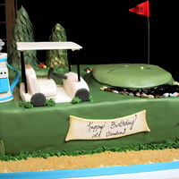 Golf Themed Birthday Cake This was for a birthday/ retirement for a golf lover. Everything is fondant or gumpaste. Thanks for looking :)