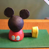 Mickey Mouse Clubhouse Body, head, and foot are all cake. Ears are foam board covered in fondant. The party got canceled, so I didn't finish adding details...