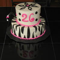 Zebra Cake With Jewels My first time using hi ratio shortening. I had fun with the stripes. WASC top tier, Darn Good Chocolate filled with buttercream and mini...