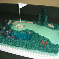 Celebrate Golf This was a fun cake to make. I decided to put some golf balls in the water, which was a big hit.