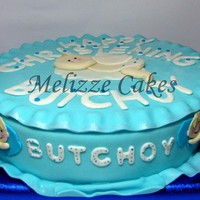 Baby Angel Cake This is a chocolate cake with ganache and MMF :) Made this for a christening of my friend's nephew. TIA :)