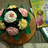 Cup Cake Bouquet Made my mom's friend a cupcake bouquet, she is right now fighting breast cancer and i just wanted to brighten up her day. :) The...