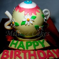 Tea Pot Cake A birthday cake for my boyfriend's mom. Its a Chocolate cake with ganache and MMF, Gumpaste for the Handle and spout. TFL :D