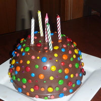 Treasure Cake This has a hard chocolate dome over the cake - there is a buttercream cake inside.Smash the shell to get to the treasure!!!