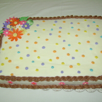 Sheet Cake This was my first attempt at making a "large" sheet cake (12 x 18). I used buttercream icing and gumpaste flowers. (I made two...