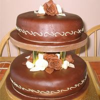Rose Chocolate Wedding Cake I made this for a friend,who loves chocolate,It was the first time I used pillars,I was a bit nervous in case they were not central but it...