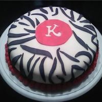 First Zebra Print Cake this is a cake me and my niece made for my mother-in-law's birthday.. it was strawberry cake with fondant