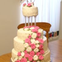 Chrissy's Wedding Cake My first wedding cake for my husband's second cousin. I baked in KY and transported to Indiana. Top tier Marble with custard filling....