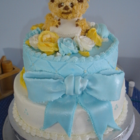 Trina's Baby Shower WASC with strawberry filling, buttercream icing and fondant accents. My first experience with High ratio shortening and Sharon Zambito'...
