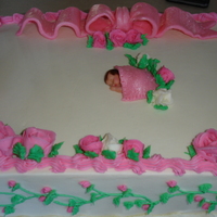 Pretty In Pink WASC with Strawberry filling. Buttercream with fondant accents. The baby is fondant and gumpaste! My first customer! She loved it! TFL