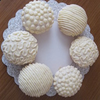 White Cupcakes 6 cupcakes, buttercream icing, vanilla cake, dots, cornelli lace and stripes.