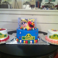The Twins Cake These cakes were made for twins first birthday. He loves Elmo and she loves Abbey.