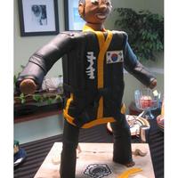 Langston's Martial Arts Cake This cake was created for a little boy who loves Martial Arts. The cake is made of cake, icing, fondant, and structural materials. It stood...