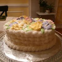 Course 2 - Final Cake This was a two layer white sponge with buttercream icing and royal icing flowers. My first attempt at royal icing; definitely need more...