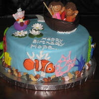 Dora And Diego Fishing For Nemo Niece could not decide between Dora or Nemo theme, so here's the compromise :) All fondant decorations (Dora figurines and fishing...