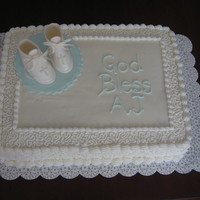 Boy, Baptism And Booties Gumpaste booties and BC decorated cake.