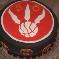Let's Go Raptors! fondant covered cake with fondant accents for my DH.