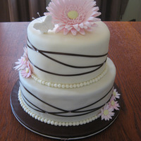 Backyard Wedding Cake Pretty, simple wedding cake for backyard wedding. Ribbon and 'diamond' embellishments are not edible.