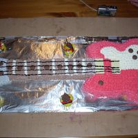 Guitar Cake i made this cake for my daughter who had a hanna montanna bithday party, this was one of my first cakes .