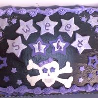 Untitled.jpg first cake... stars and skull and crossbones are fondant