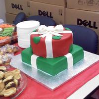 Stacked Presents Top was a 9in round pink champagne cake and the bottom was a 10 inch square chocolate and mint cake.