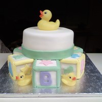 Cake On Blocks Top 8 inch round was a pink champagne cake while the blocks were chocolate cake!